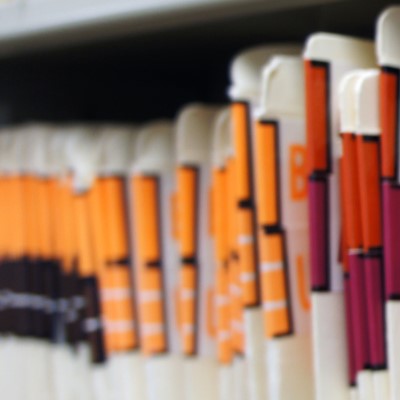 Row of color-coded medical records