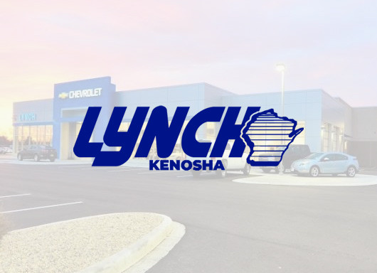 Lynch Chevrolet logo with dealership in background