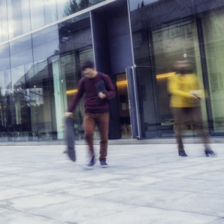 Blurry students walking on university campus